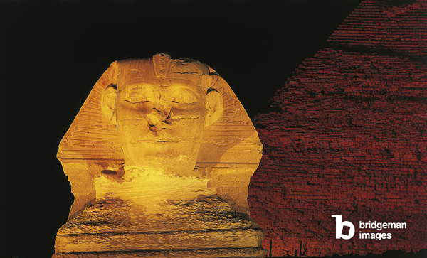 Great Sphinx and Chefren pyramid behind at night