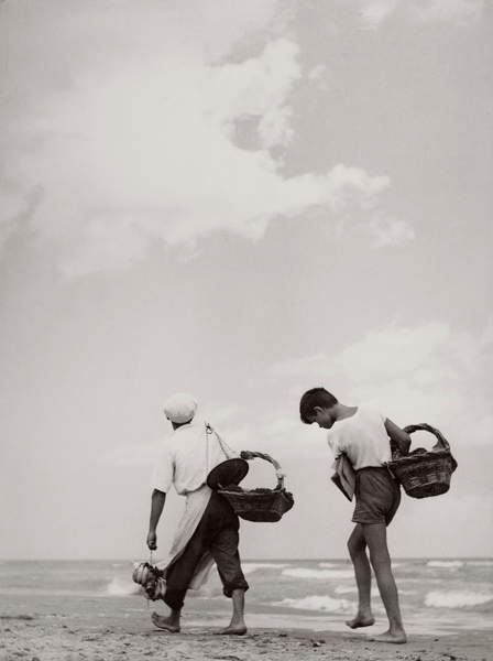 Young boys selling products on the beach in Italy, 30's, 40's, black and white photo