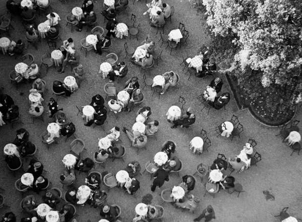 shot from above, view of people sitting at tables in the Thermal tower plant in Montecatini Terme, Pistoia, Tuscany, Italy, 1954, 50's