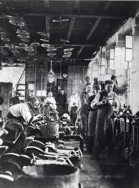 photo of Cutlers at work in the workshop, France, late 19th century (b/w photo), French Photographer, (19th century) / © Archives Charmet / Bridgeman Images