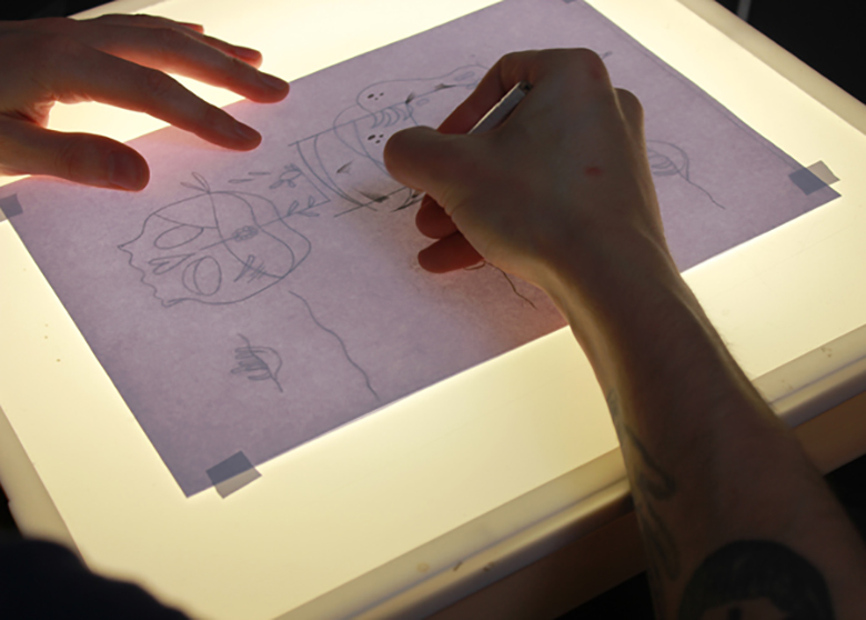The artist Nik van Es gets to work with initial drawings