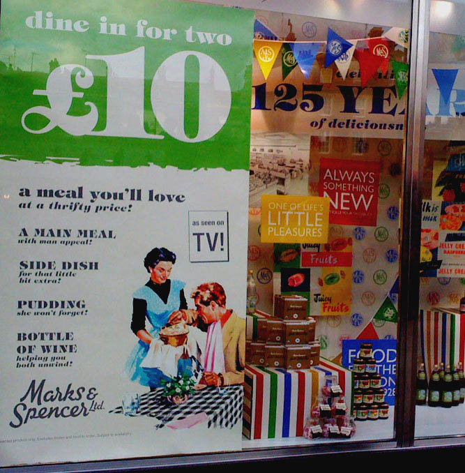 Marks and Spencer store window on Oxford Street featuring Bridgeman/Advertising Archives image. June 09.